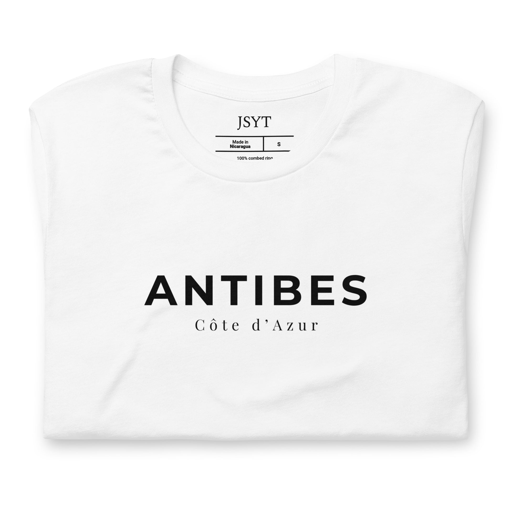 White t-shirt with 'ANTIBES CÓte d'Azur' text on a white background. Antibes tee. Antibes , France t-shirt.