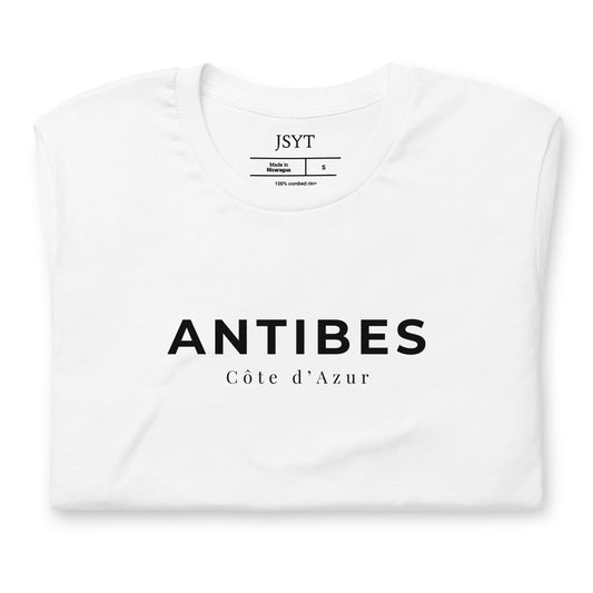 White t-shirt with 'ANTIBES CÓte d'Azur' text on a white background. Antibes tee. Antibes , France t-shirt.
